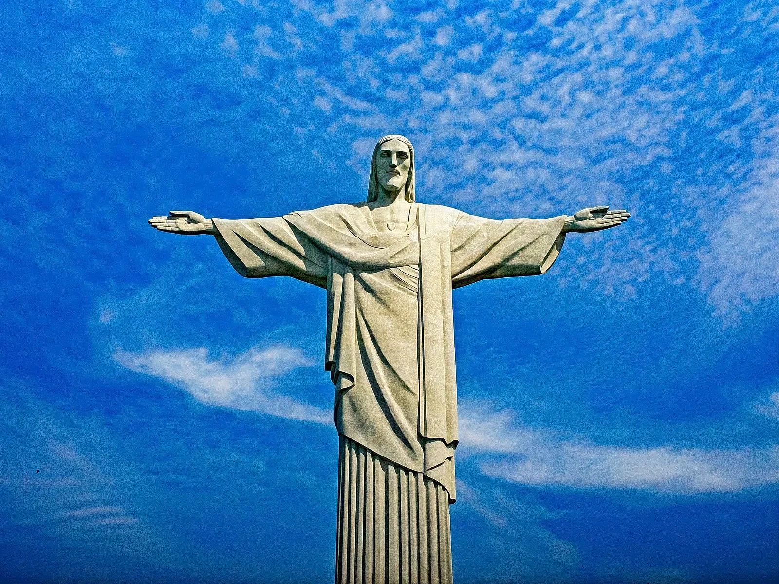 Christ the Redeemer atop Corcovado mountain at sunrise